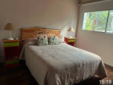 Dormitorio principal, Alquiler temporario de casa em Mar de las pampas