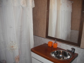 baño title=