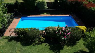 VISTA PISCINA Y PARQUE, Alquiler temporario de casa em Miramar